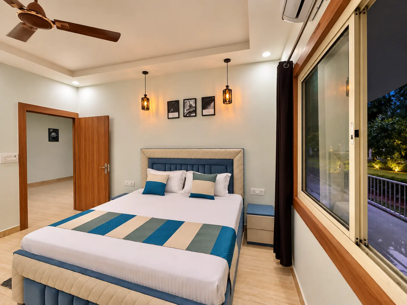 Bedroom one at Mulberry Farm farmhouse, Noida — double bed with garden window