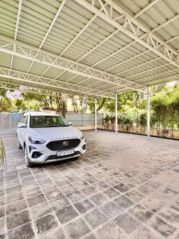 Entrance gate and covered parking at Mulberry Farm, Sector 135 Noida