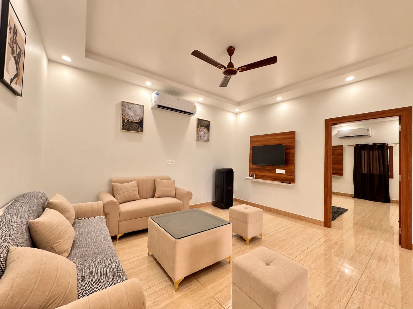 The marble-floored living room at Mulberry Farm looking towards the veranda